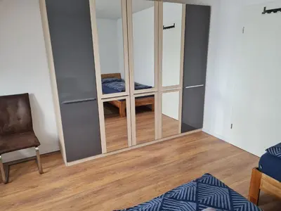 Ein Bett oder Betten in einem Zimmer der Unterkunft Schöne Dachgeschoss Wohnung