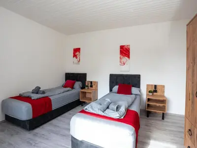 Ein Bett oder Betten in einem Zimmer der Unterkunft Serviceroom24 - Apartment 5 in Recklinghausen WLAN - Smart-TV - 24-7 Check-in und Küche