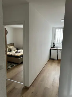Ein Bett oder Betten in einem Zimmer der Unterkunft City-See Central Apartment