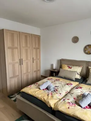 Ein Bett oder Betten in einem Zimmer der Unterkunft City-See Central Apartment