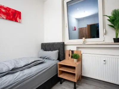 Ein Sitzbereich in der Unterkunft Serviceroom24 - Apartment 3 in Recklinghausen WLAN - Smart-TV - 24-7 Check-in und Küche