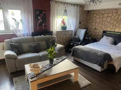 Ein Bett oder Betten in einem Zimmer der Unterkunft Gästezimmer in Ratingen bei Düsseldorf mit einem Hauch Luxus