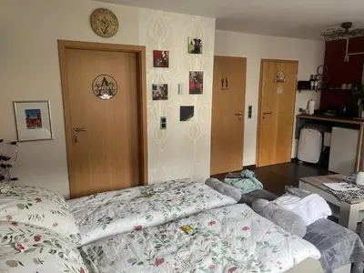 Ein Bett oder Betten in einem Zimmer der Unterkunft Gästezimmer in Ratingen bei Düsseldorf mit einem Hauch Luxus
