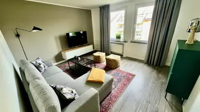 Ein Sitzbereich in der Unterkunft Apartment 2- Modernes Studio in Duisburg Meiderich, 4,7 km Hbf, U-Bahn 250m, Flughafen Düsseldorf 28 km, Landschaftspark 2,9 km, 5 Gehminuten von Herzklinik entfernt