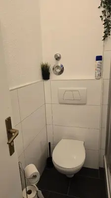 Ein Badezimmer in der Unterkunft HagenStay Delstern 1