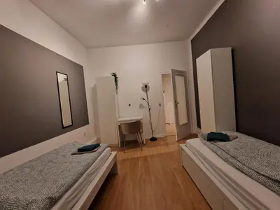 Ein Bett oder Betten in einem Zimmer der Unterkunft HagenStay Delstern 1