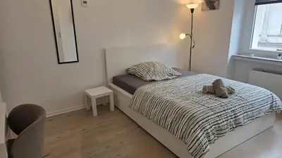 Ein Bett oder Betten in einem Zimmer der Unterkunft HagenStay Delstern 1