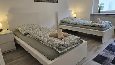 Ein Bett oder Betten in einem Zimmer der Unterkunft HagenStay Delstern 1
