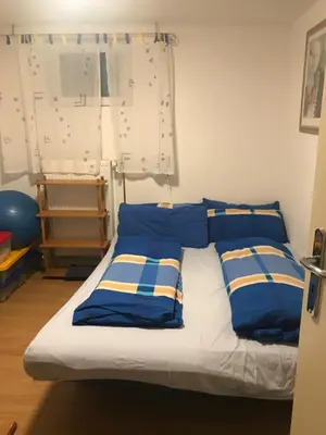 Ein Bett oder Betten in einem Zimmer der Unterkunft Ferien-Monteur-Wohnung am Bach im Grünen mit 3 Schlafzimmer