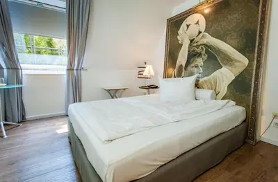 Ein Bett oder Betten in einem Zimmer der Unterkunft Hotel der Lennhof