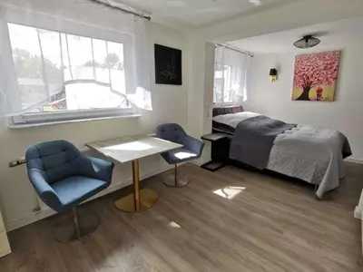 Ein Bett oder Betten in einem Zimmer der Unterkunft Apartment bei der Palme mit Sauna Möglichkeit