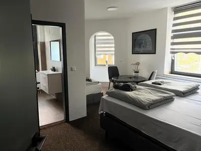 Ein Bett oder Betten in einem Zimmer der Unterkunft Duisburger Hostel