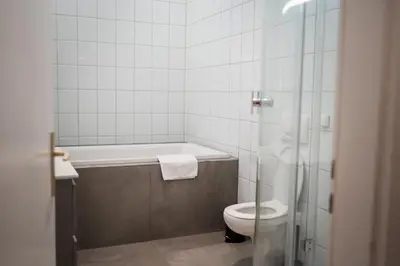 Ein Badezimmer in der Unterkunft Junik Apartments - Ferienwohnungen in Duisburg