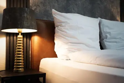 Ein Bett oder Betten in einem Zimmer der Unterkunft Junik Apartments - Ferienwohnungen in Duisburg