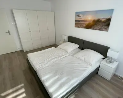 Ein Bett oder Betten in einem Zimmer der Unterkunft Gemütliches Apartment in Duisburg