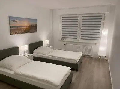 Ein Bett oder Betten in einem Zimmer der Unterkunft Gemütliches Apartment in Duisburg