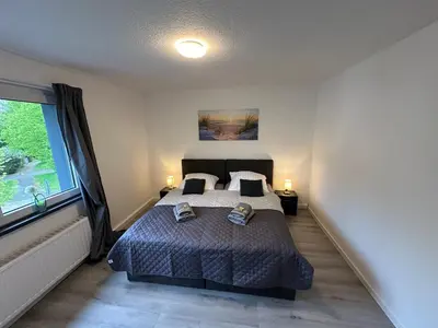 Ein Bett oder Betten in einem Zimmer der Unterkunft Moderne Ferienwohnung für 4-5 Personen mitten in Herten*Netflix*Nespresso