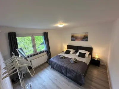 Ein Bett oder Betten in einem Zimmer der Unterkunft Moderne Ferienwohnung für 4-5 Personen mitten in Herten*Netflix*Nespresso