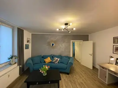 Ein Sitzbereich in der Unterkunft Cozy Apartment