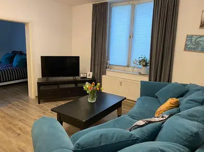 Ein Sitzbereich in der Unterkunft Cozy Apartment
