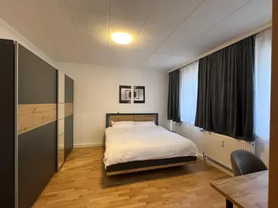 Ein Bett oder Betten in einem Zimmer der Unterkunft My Pension Duisburg