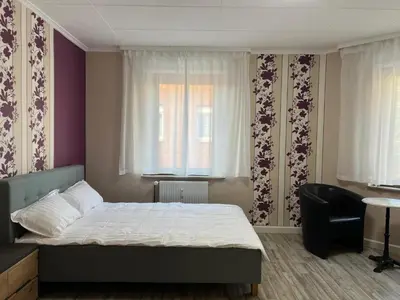 Ein Bett oder Betten in einem Zimmer der Unterkunft My Pension Duisburg