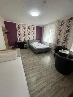 Ein Bett oder Betten in einem Zimmer der Unterkunft My Pension Duisburg