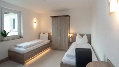 Ein Bett oder Betten in einem Zimmer der Unterkunft ERSTAY