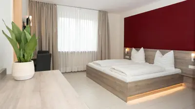 Ein Bett oder Betten in einem Zimmer der Unterkunft ERSTAY