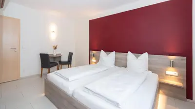 Ein Bett oder Betten in einem Zimmer der Unterkunft ERSTAY