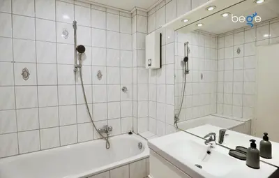 Ein Badezimmer in der Unterkunft BEGE APARTMENTS Executive Lodgings
