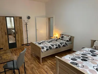 Ein Bett oder Betten in einem Zimmer der Unterkunft OnThePoint, Erdgeschoss, Abstellplatz für Fahrräder, City und Innenhafen 5 Gehminuten!!!