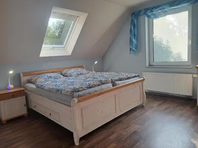 Ein Bett oder Betten in einem Zimmer der Unterkunft Niederrheinhaus
