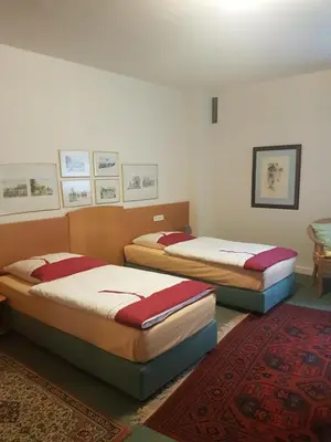 Ein Bett oder Betten in einem Zimmer der Unterkunft Gästehaus Krefeld Uerdingen