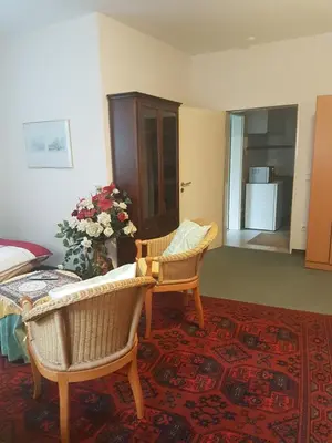 Ein Sitzbereich in der Unterkunft Gästehaus Krefeld Uerdingen