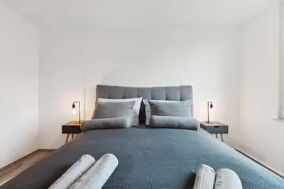 Ein Bett oder Betten in einem Zimmer der Unterkunft Stylisches Apartment, 2-5 Personen, Zentral, Nähe Messe