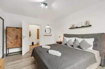 Ein Bett oder Betten in einem Zimmer der Unterkunft Stylisches Apartment, 2-5 Personen, Zentral, Nähe Messe