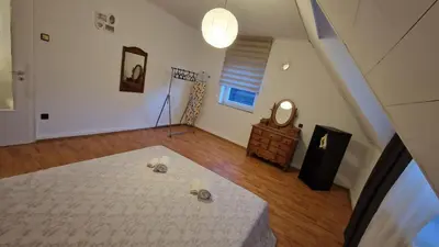 Ein Bett oder Betten in einem Zimmer der Unterkunft Canim Appartement