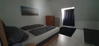Ein Bett oder Betten in einem Zimmer der Unterkunft Hagen- viel schöner Raum und Platz für 6 Personen