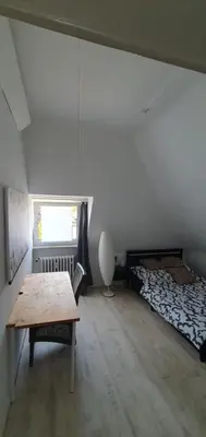 Ein Bett oder Betten in einem Zimmer der Unterkunft Hagen- viel schöner Raum und Platz für 6 Personen