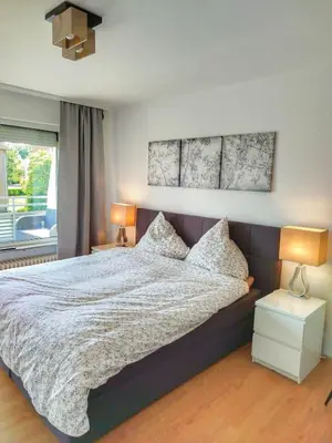 Ein Bett oder Betten in einem Zimmer der Unterkunft 2,5 Zimmer Apartment mit Balkon