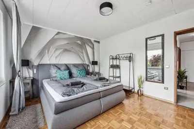 Ein Bett oder Betten in einem Zimmer der Unterkunft P&K Apartment