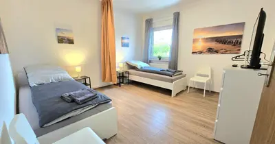 TV/Unterhaltungsangebot in der Unterkunft Modern 4-Room Apartment with Balcony & Free Parking & Free Wi-Fi - KA02