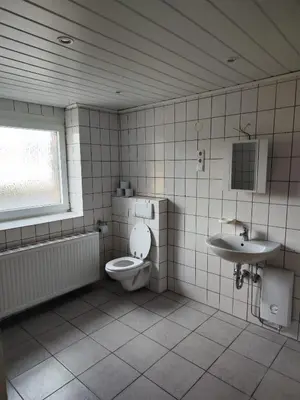Ein Badezimmer in der Unterkunft Monteurwohnung Haus Elbert 4