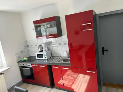 Küche/Küchenzeile in der Unterkunft Monteurwohnung Haus Elbert 4