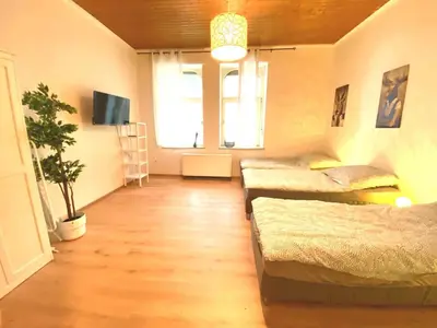 Ein Bett oder Betten in einem Zimmer der Unterkunft Apartments in Essen