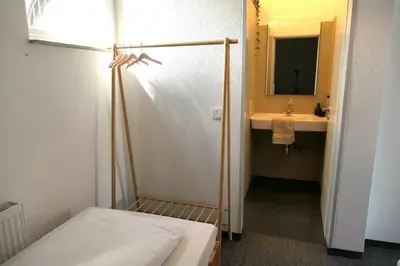Ein Bett oder Betten in einem Zimmer der Unterkunft Stilvolle Erdgeschoss-Wohnung: Gemütlich eingerichtet mit eigenem Eingang