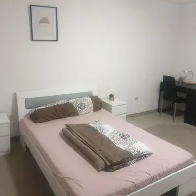 Ein Bett oder Betten in einem Zimmer der Unterkunft Privaterooms
