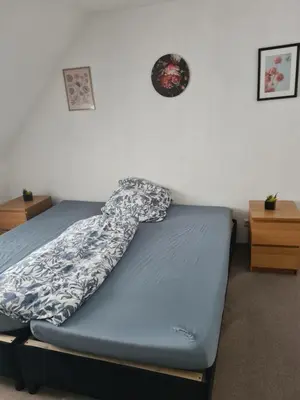 Ein Bett oder Betten in einem Zimmer der Unterkunft Privaterooms