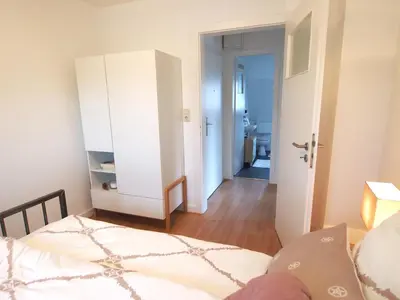 Ein Bett oder Betten in einem Zimmer der Unterkunft Ferienwohnung Lennehimmel